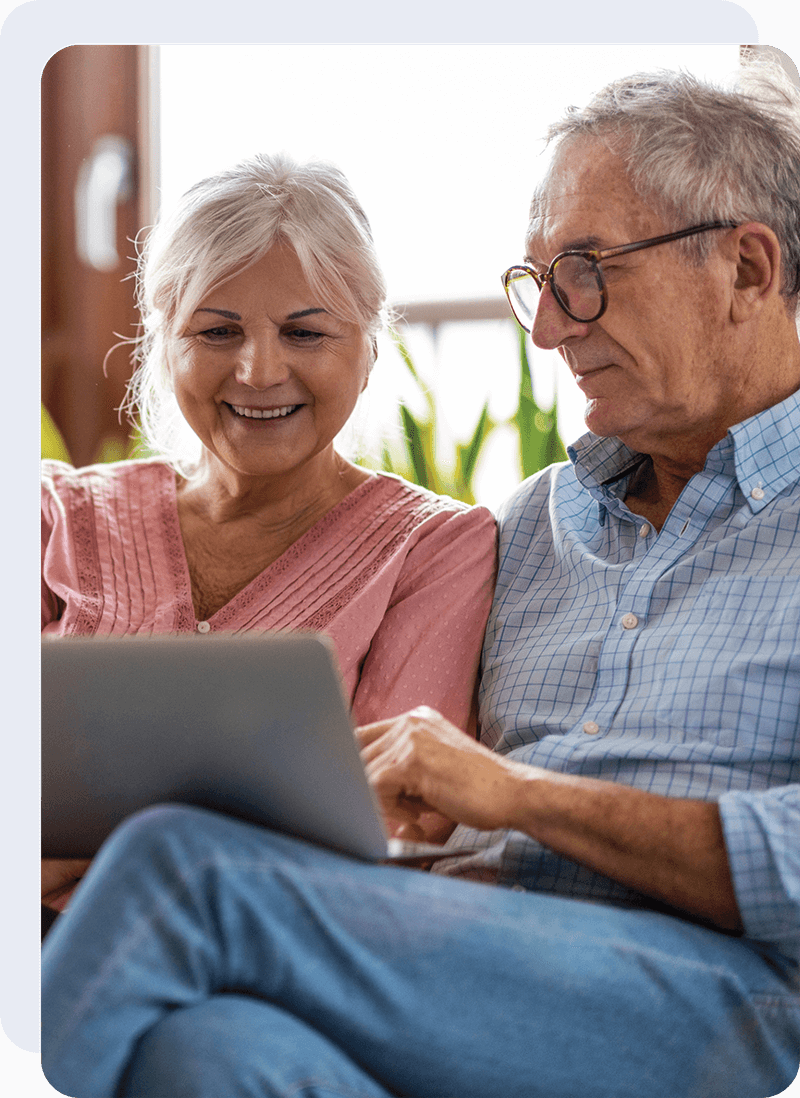 A mature couple choosing a Cataract Surgeon on the website