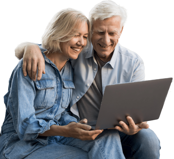 A mature couple checking online for the Best Cataract Surgeon Resources