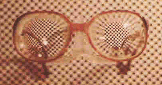 Coke-bottle or aphakic spectacles from the pre-1970s